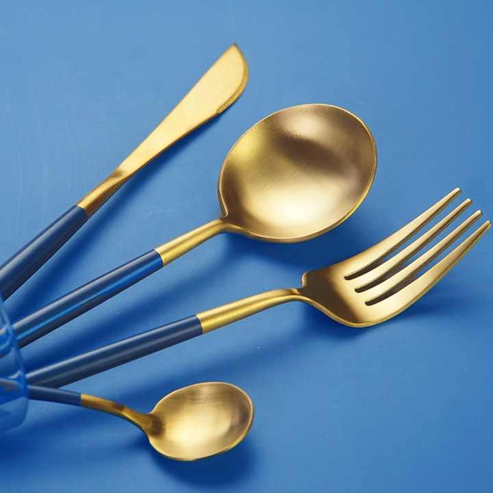 GOLD PORK AND SPOON